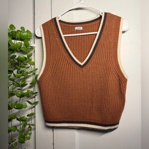 Garage sweater vest